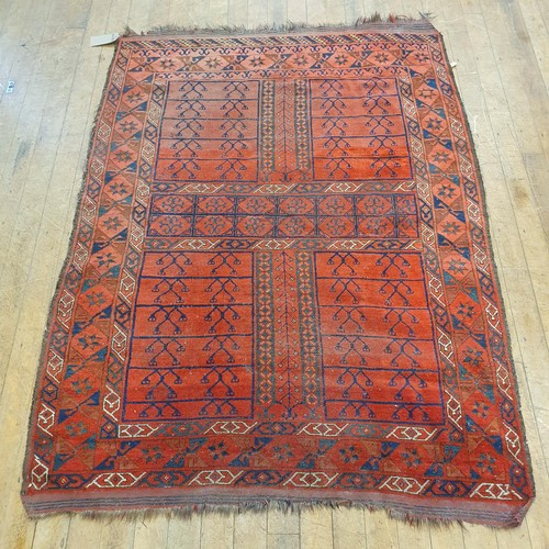 859 - A Persian type red ground rug, 185 x 137 cm