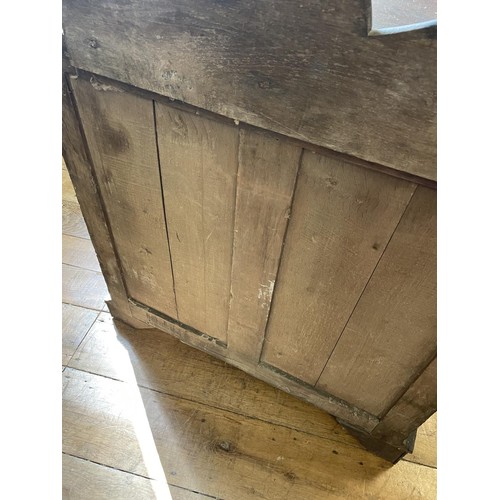 759 - An 18th century oak chest, having four drawers, 93 cm wide