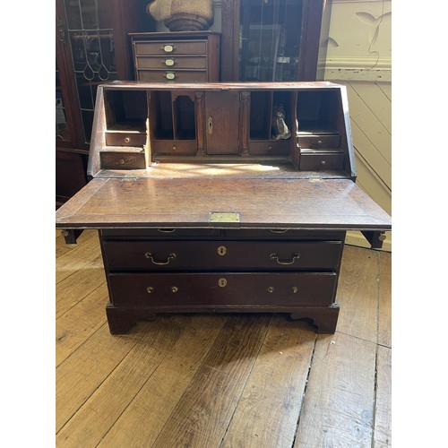 758 - An oak bureau, 90 cm wide, a wall shelf, an oak cupboard, and a corner cabinet (4)