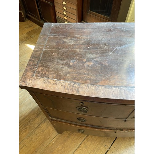 756 - A mahogany bow front chest, 86 cm wide, a bedroom mirror, a corner cupboard, four bedpans, and two r... 