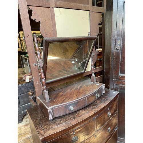 756 - A mahogany bow front chest, 86 cm wide, a bedroom mirror, a corner cupboard, four bedpans, and two r... 