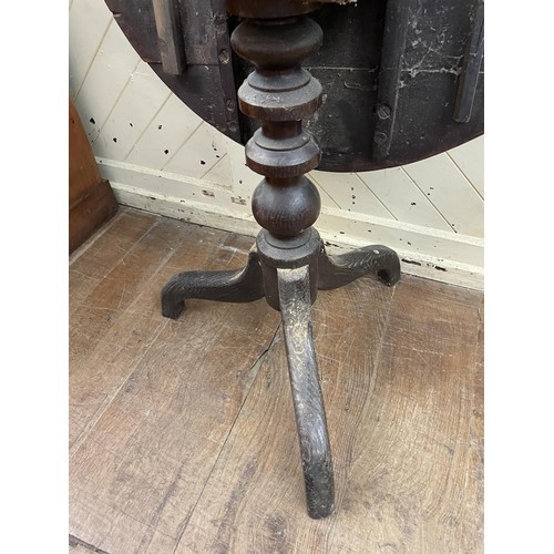 746 - An oak tilt top table, 58 cm diameter, a painted chest of drawers, and an oak trunk (3)