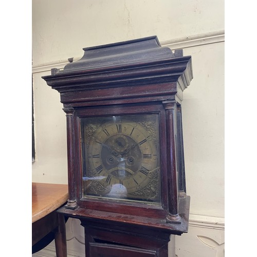 751 - A longcase clock, the brass dial with Roman numerals, subsidiary seconds dial, and date aperture, si... 