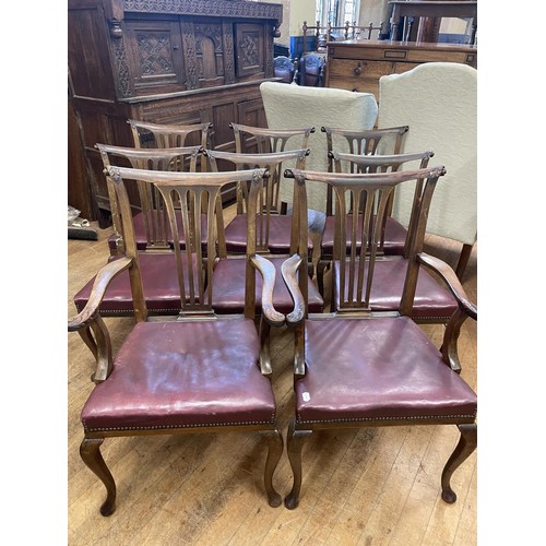 894 - A set of eight mahogany dining chairs, with pierced splat backs, with upholstered seats on cabriole ... 