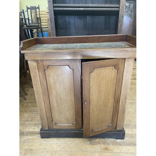 891 - A mahogany cupboard, with raised gallery back, and tooled leather writing top, 103 cm wide