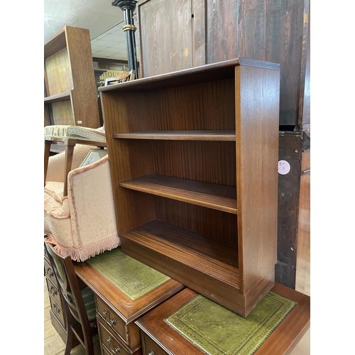 788 - An oak waterfall bookcase, 101 cm wide, a mahogany CD rack, a washstand, a map, two single chairs, a... 