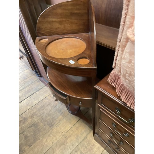 788 - An oak waterfall bookcase, 101 cm wide, a mahogany CD rack, a washstand, a map, two single chairs, a... 