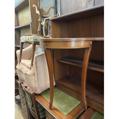 788 - An oak waterfall bookcase, 101 cm wide, a mahogany CD rack, a washstand, a map, two single chairs, a... 