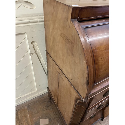 804 - A 19th century Continental cylinder bureau, 104 cm wide