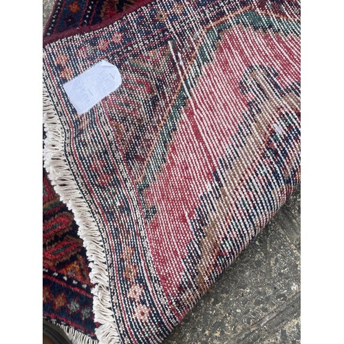 838 - A Persian type red ground runner, 250 x 73 cm