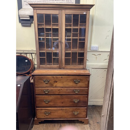 742 - A pine secretaire bookcase, 100 cm wide