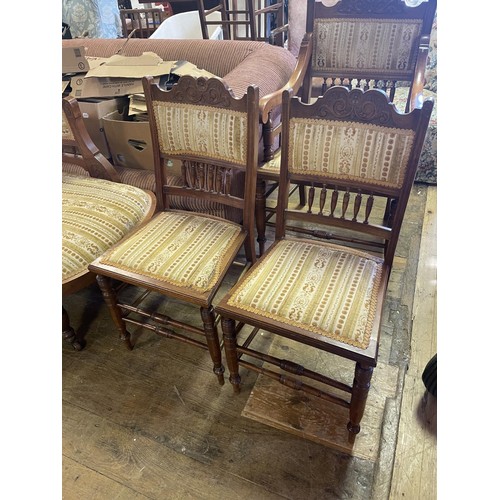 777 - An early 20th century parlour suite, comprising a chaise longue, with carved walnut frame, a pair of... 