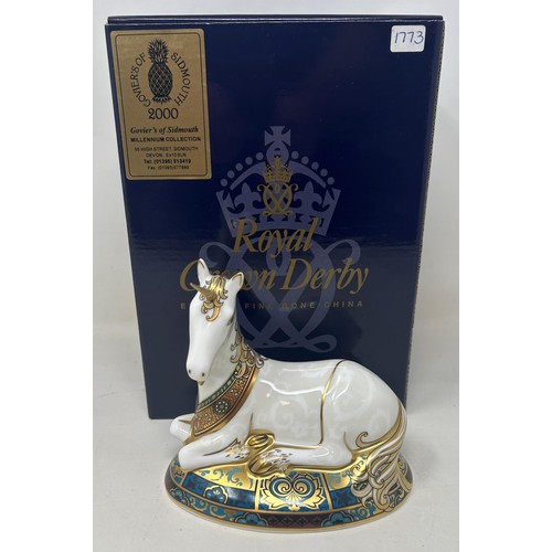 657 - A Royal Crown Derby limited edition paperweight, Unicorn, 1773/2000, 14 cm high, with a certificate,... 