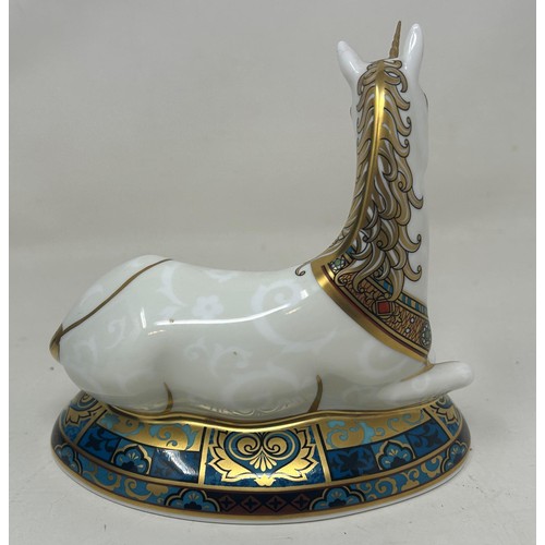 657 - A Royal Crown Derby limited edition paperweight, Unicorn, 1773/2000, 14 cm high, with a certificate,... 