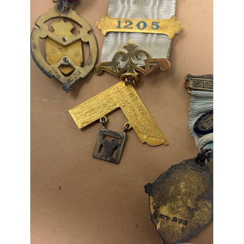 671 - An 18ct gold Masonic medallion, and two other Masonic medals