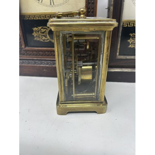 672 - A carriage clock, in a brass and glass case, a silver cased clock, and two American mantel clocks (4... 