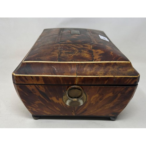 681 - A 19th century tortoiseshell jewellery box, 31 cm wide