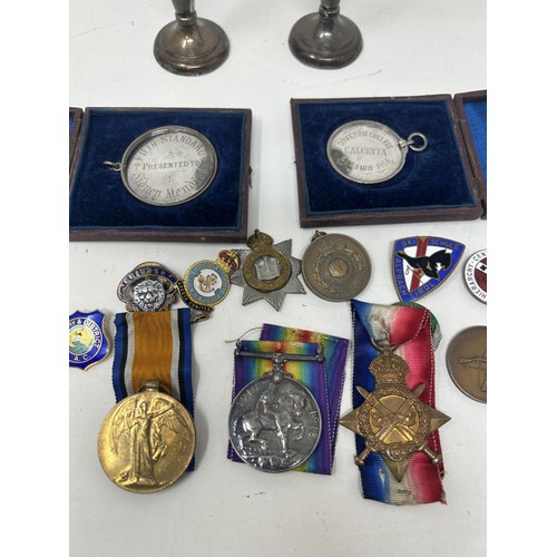 684 - A pair of silver posy vases, assorted medals, tokens, medallions and other items (box)