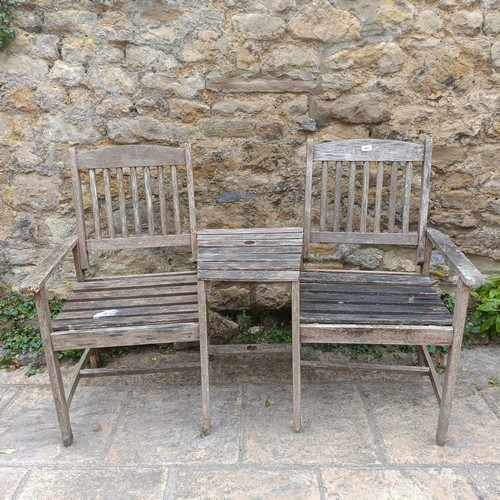 961 - A garden double seat, 142 cm wide