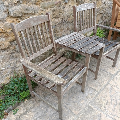 961 - A garden double seat, 142 cm wide