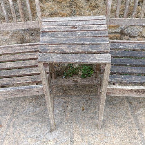 961 - A garden double seat, 142 cm wide