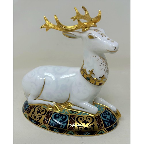 662 - A Royal Crown Derby limited edition paperweight, The White Hart, 182/2000, 14 cm high, with a certif... 