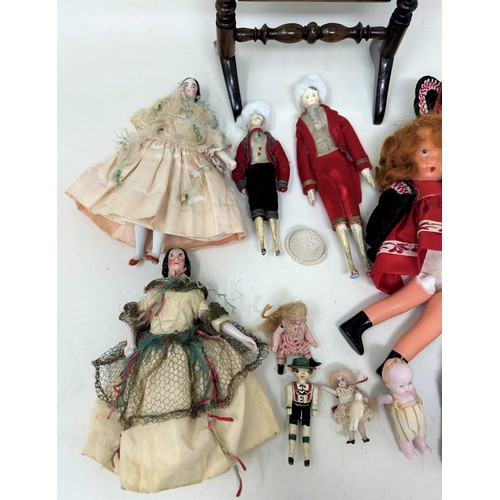 703 - An early 20th century porcelain headed doll, and assorted other dolls (box)