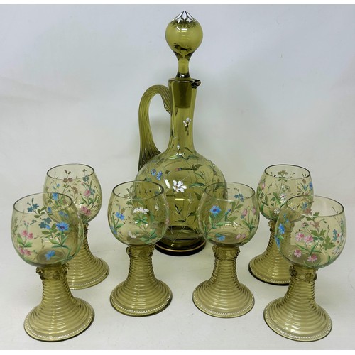 704 - A pair of opaque glass vases, 30 cm high, a green glass ewer, and six matching wine glasses, over en... 