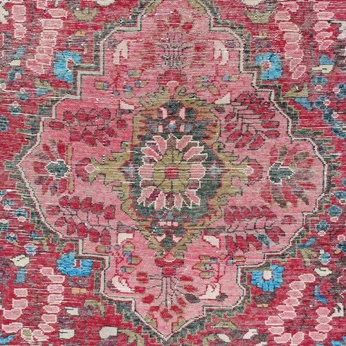 939 - A Persian red ground rug, 205 x 157 cm