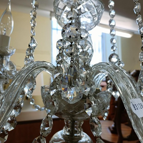 935 - A cut glass five branch chandelier, 45 cm diameter