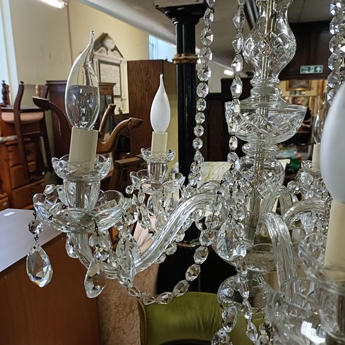 935 - A cut glass five branch chandelier, 45 cm diameter