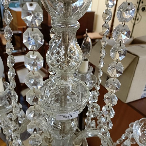 935 - A cut glass five branch chandelier, 45 cm diameter