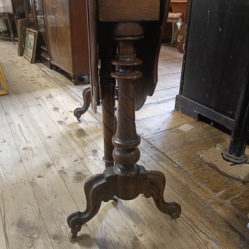 931 - A 19th century, walnut serpentine Sutherland table, 19 cm wide