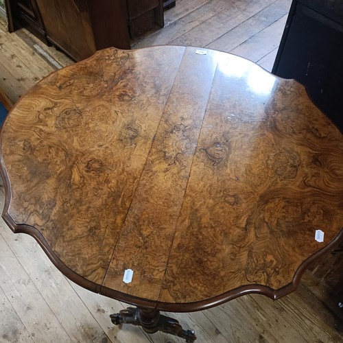 931 - A 19th century, walnut serpentine Sutherland table, 19 cm wide