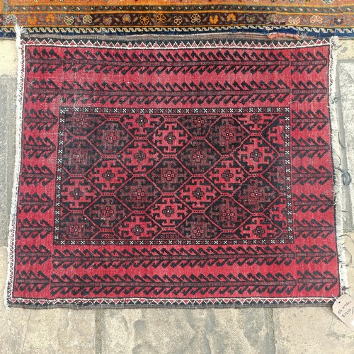 927 - A Persian blue ground rug, 107 x 76 cm, and a red ground rug, 86 x 76 cm (2)