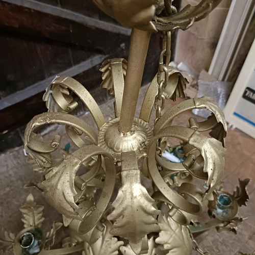 921 - A gilt metal chandelier, decorated leaves, 56 cm diameter