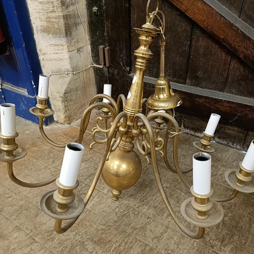 920 - A Dutch style eight branch brass chandelier, 70 cm diameter