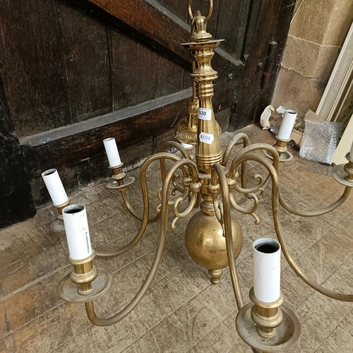 920 - A Dutch style eight branch brass chandelier, 70 cm diameter