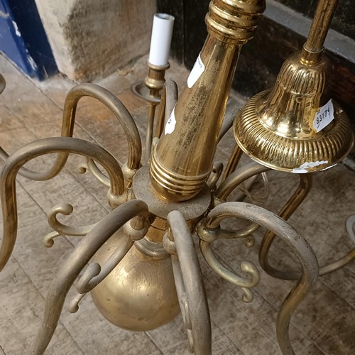 920 - A Dutch style eight branch brass chandelier, 70 cm diameter