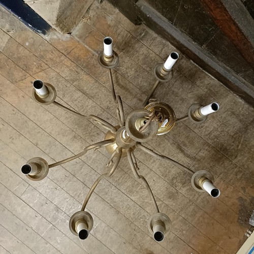 920 - A Dutch style eight branch brass chandelier, 70 cm diameter