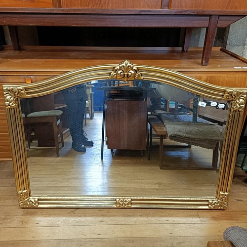 904 - A gilt framed overmantel mirror, 190 x 130 cm