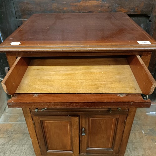 898 - A mahogany piano stool, and a music cabinet