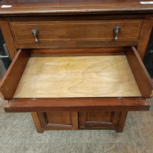 898 - A mahogany piano stool, and a music cabinet