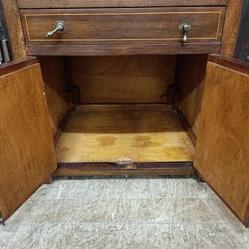 898 - A mahogany piano stool, and a music cabinet