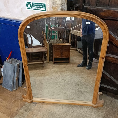 893 - A pine framed overmantel mirror, 140 x 110 cm