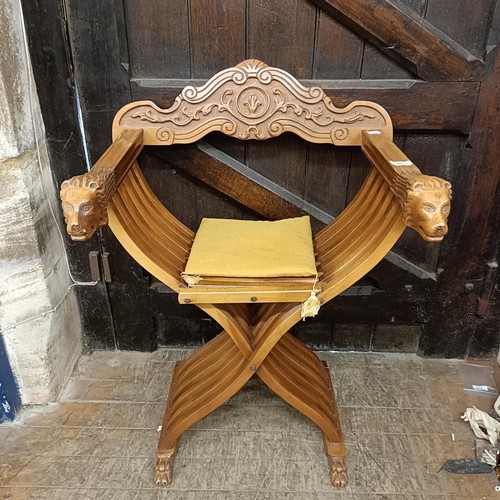 885 - A 20th century Savonarola chair, and two Chinese panels, 60 x 35 cm (3)