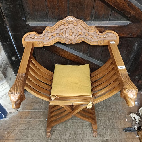 885 - A 20th century Savonarola chair, and two Chinese panels, 60 x 35 cm (3)