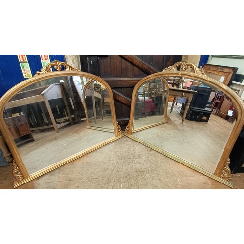 883 - A pair of gilt framed overmantel mirrors, 145 x 106 cm (2)