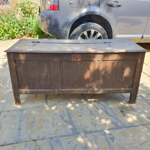 908 - An oak coffer, 127 cm wide