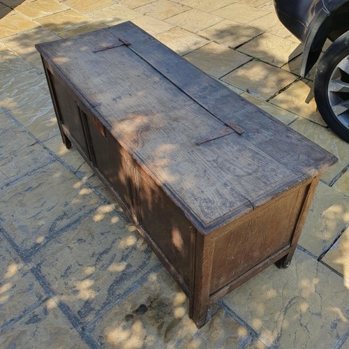 908 - An oak coffer, 127 cm wide